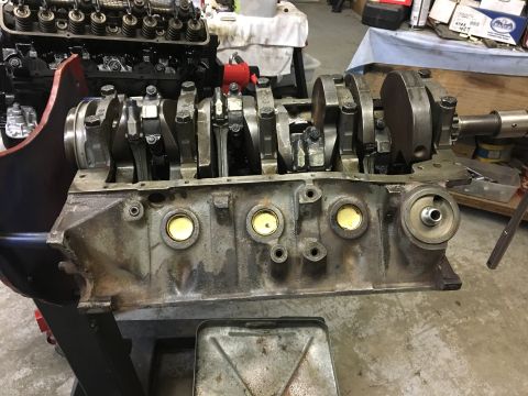 1976 Ford Ranchero - Close-up view of an engine block assembly, showing the crankshaft and connecting rods.