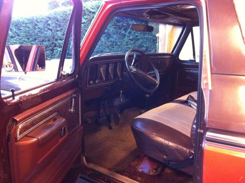 1978 Ford Bronco - Interior view of a 1978 Ford Bronco, highlighting the dashboard and seating.