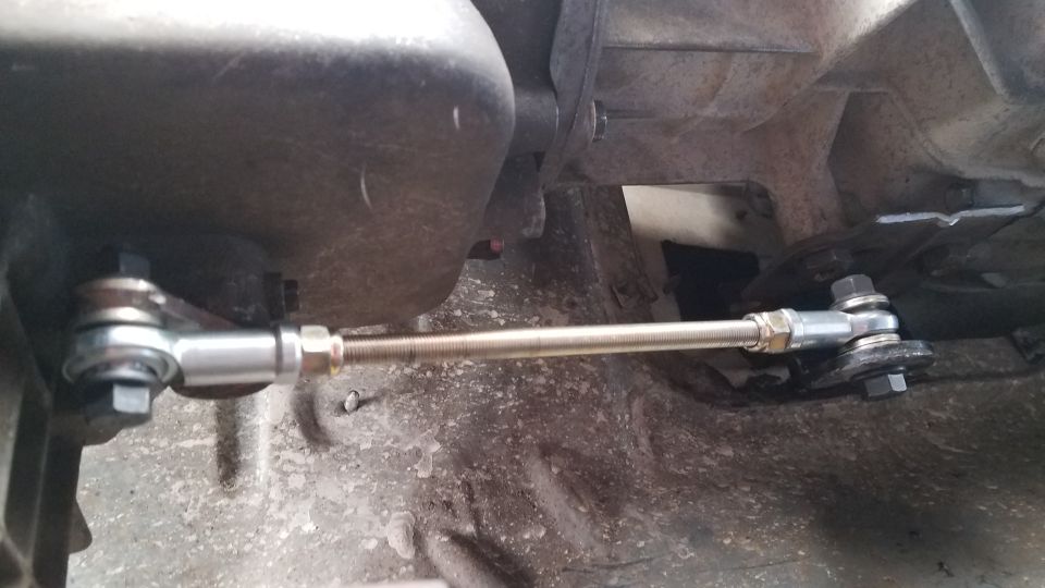 Aftermarket shifter linkage connecting transmission components