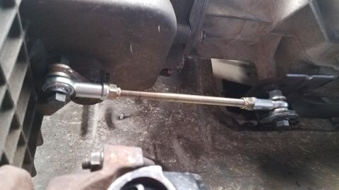 1985 Ford Bronco - Close-up view of an adjustable transmission linkage, likely part of a modification or repair.