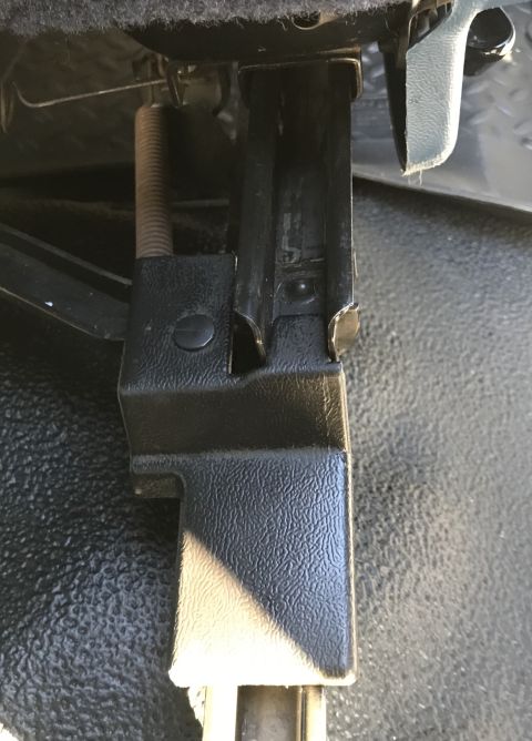 1995 Ford Bronco - Close-up of the seat adjustment mechanism in a 1995 Ford Bronco.
