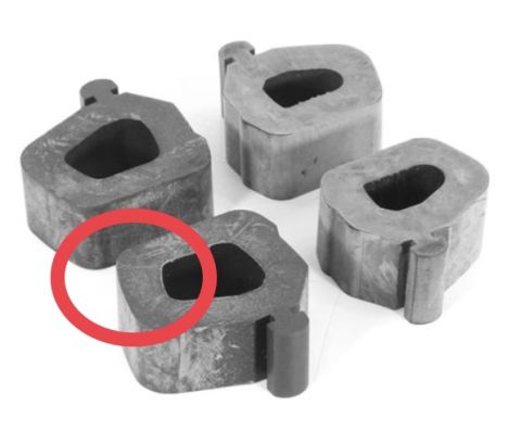 1995 Ford Bronco - Four rubber bump stops are shown in this image.