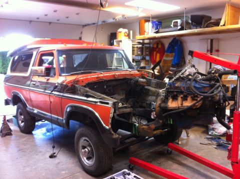 1978 Ford Bronco - This 1978 Ford Bronco is undergoing engine removal in a garage setting.
