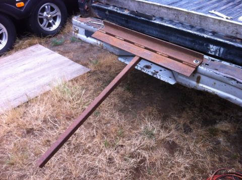 1978 Ford Bronco - Custom metal ramp attached to the rear of a pickup truck bed.