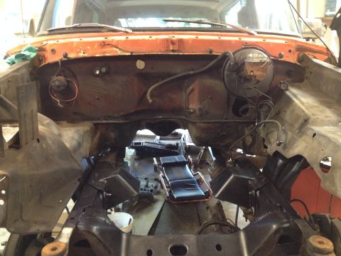 1978 Ford Bronco - The engine bay of a 1978 Ford Bronco is shown during a restoration project.