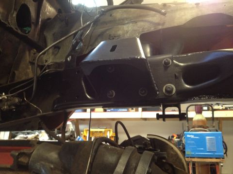 1978 Ford Bronco - Close-up view of vehicle frame components, including a newly installed bracket.