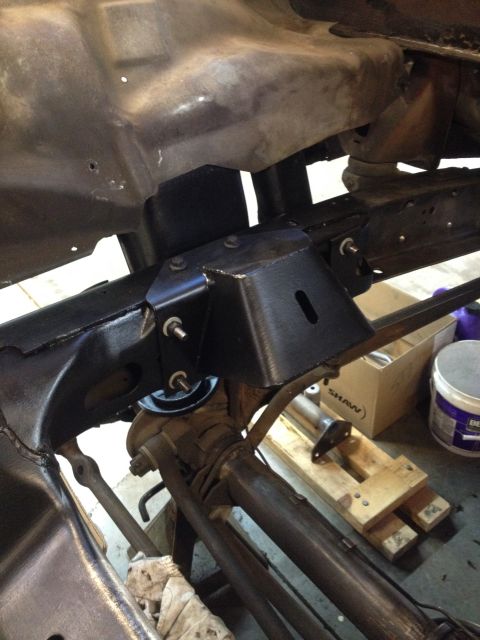 1978 Ford Bronco - Close-up view of vehicle frame and suspension components during a build or repair.