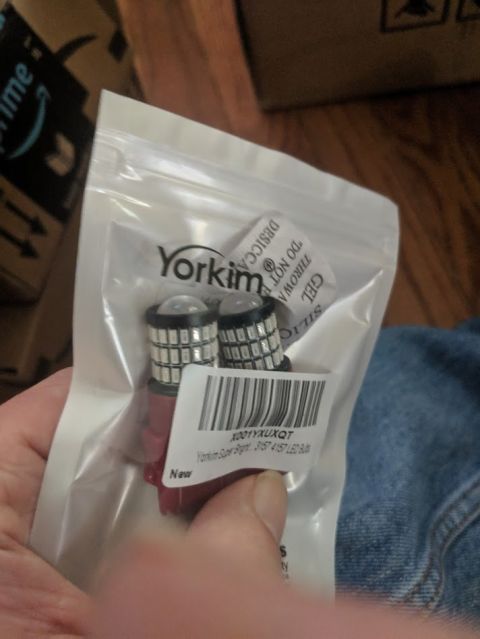 2014 Harley-Davidson FXDWGI Wide Glide - Bagged Yorkim brand LED bulbs with a barcode and 'DO NOT EAT' silica gel packet.