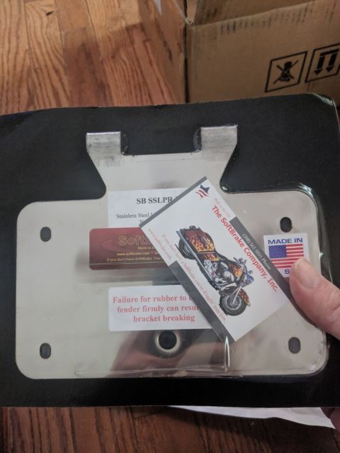 2014 Harley-Davidson FXDWGI Wide Glide - A stainless steel license plate bracket from SoftBrake Company, Inc. is shown, with a warning about potential bracket failure.