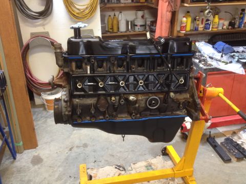 1978 Ford Bronco - Engine assembly mounted on an engine stand, ready for installation or work.