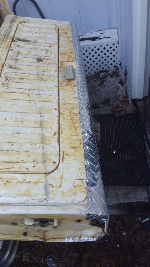 1988 Ford Bronco - inside lip of the diamond plate. its recessed at the handle so you wont get cut opening the tailage