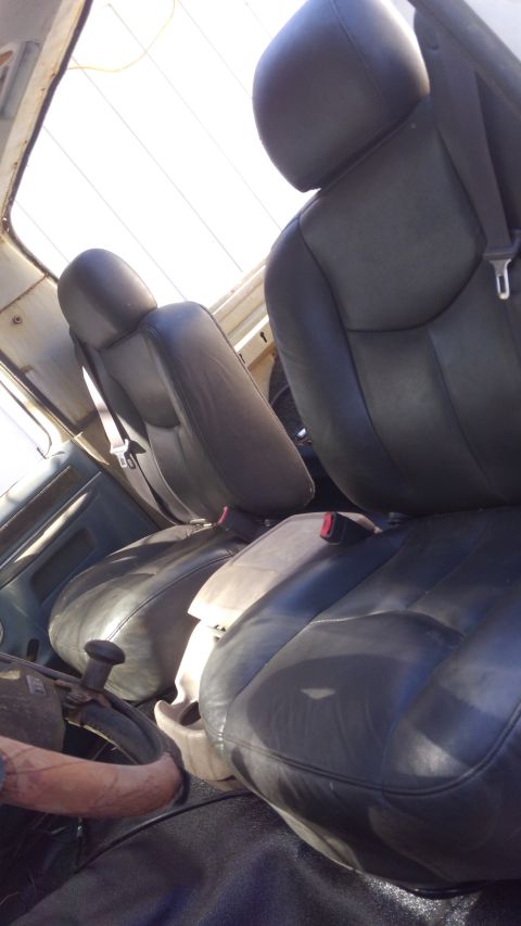 1988 Ford Bronco - new seats from a ~2000s Chevy (probably Silverado). looked through the junkyard for the best pair of seats i could that were not cloth. the…