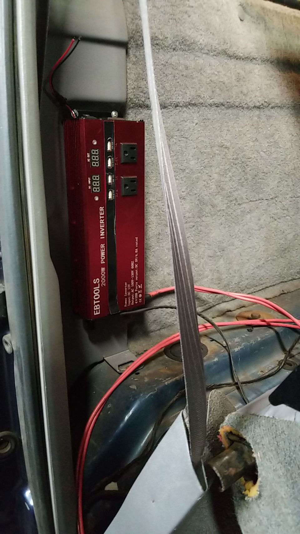 The 2KW inverter is wired to the battery positive via a 175A Mega fuse and two 8ga wires.  It has 4 USB jacks, and low & hi voltmeters.  Later, I'll add a remote switch...