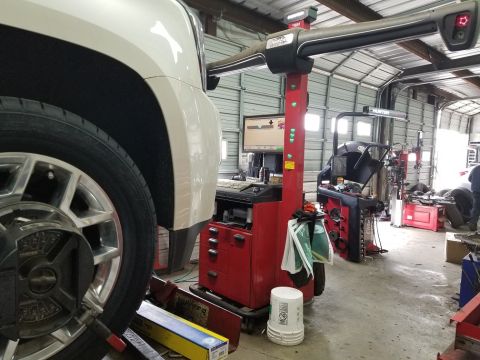 1983 Ford Bronco - This is among the best alignment machines available today, and the road-force balancer behind it is also very good. The device clamped to t…