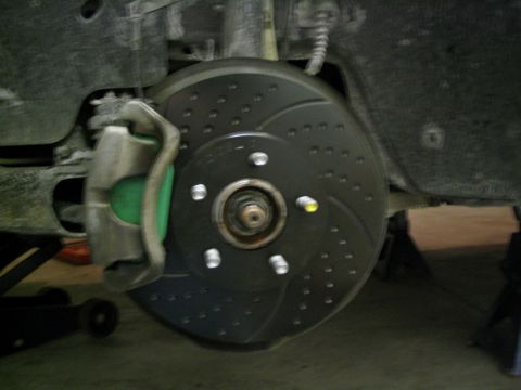 1996 Mercury Sable - This photo shows a vehicle's brake rotor and caliper, not a 1996 Mercury Sable.