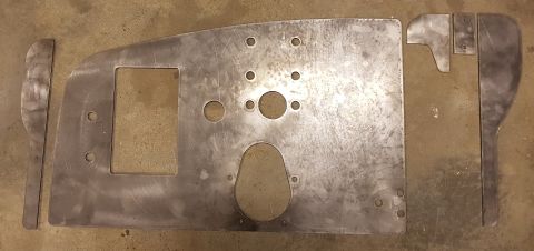 1978 Ford Bronco - These metal panels appear to be custom fabricated parts, possibly for a vehicle's interior or firewall, with no clear year identification.