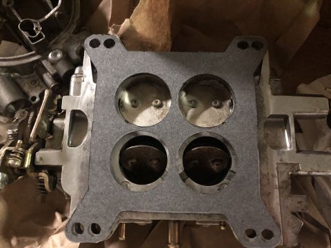 1980 Ford Bronco - A gasket for a four-barrel carburetor intake manifold is shown.