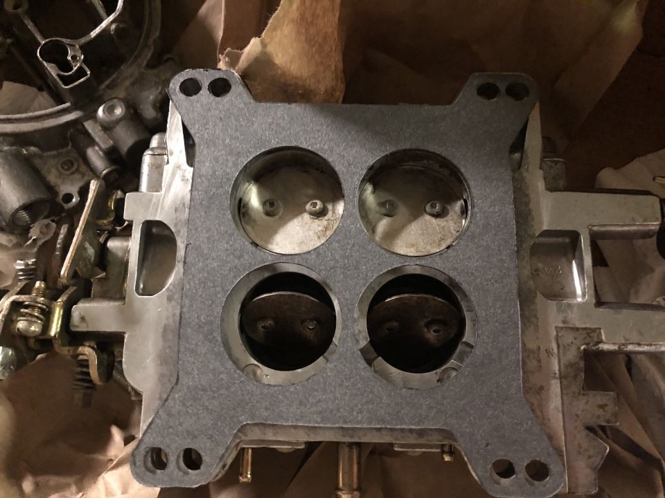 Carburetor intake manifold gasket with four ports