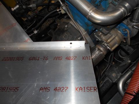 1992 Ford Bronco - Aluminum panel with stamped markings 6061-T6 AMS 4027 KAISER is visible in the engine bay.