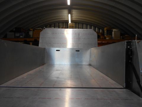 1992 Ford Bronco - Interior view of an empty aluminum truck bed, showing the metal construction.