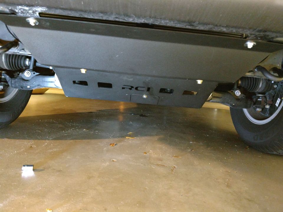 Underbody armor plate with RCI logo on a 2018 Toyota 4Runner, viewed from below