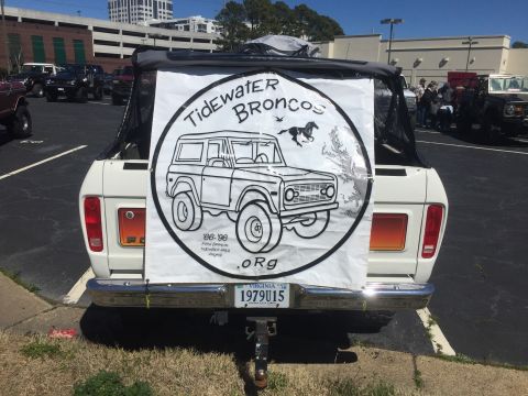 1979 Ford Bronco - Rear view of a 1979 Ford Bronco with a Tidewater Broncos club banner and license plate.