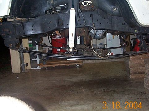 1986 Ford Bronco - Better. Still about 5.5" higher where spring bolts in the front, but I am happy with this. We shall see how it flexes