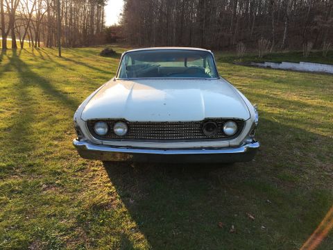1960 Ford Starliner - This 1961 Ford Falcon has a distinctive grille and dual headlights.