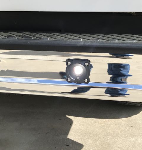 1995 Ford Bronco - An aftermarket LED light is attached to the chrome bumper of a vehicle.