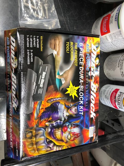 1992 Jeep Wrangler - Packaging for a 6 Piece Dura-Block Kit, clown graphics and automotive supplies.