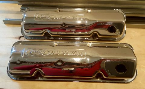 1973 Ford Mustang - Pair of chrome valve covers with Ford branding visible.