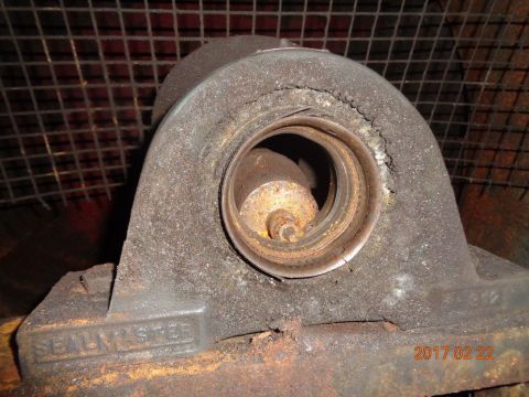 1965 Ford Mustang - A close-up view of a worn and rusty Sealmaster bearing, showing internal components and a date stamp.
