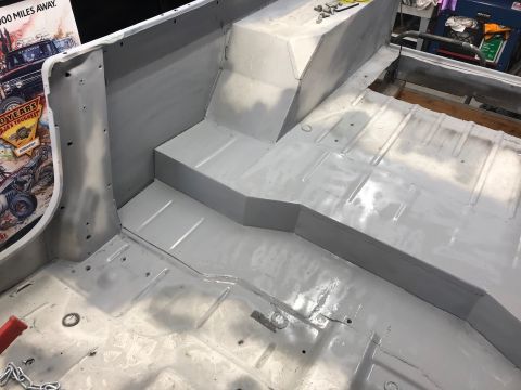 1992 Jeep Wrangler - The interior floor of a Jeep CJ is shown after being prepped for a new coating.