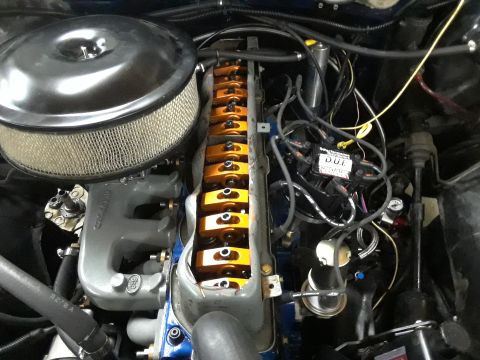 1985 Ford Bronco - Close-up view of an engine bay, showing various components of the fuel and ignition systems.
