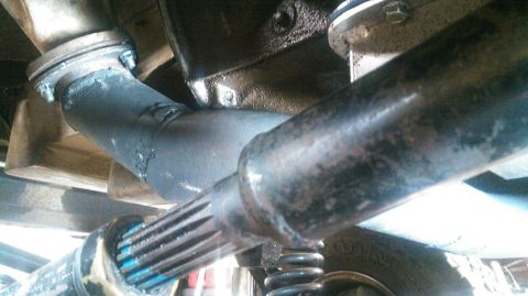 1978 Ford Bronco - Underside view of driveshaft and transmission components, with a visible Supermotors.net watermark.