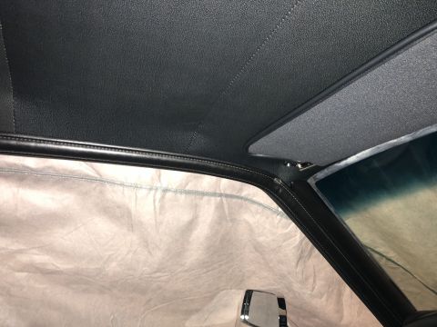 1968 Mercury Cougar - Interior shot showing the headliner and sun visor of a vehicle.