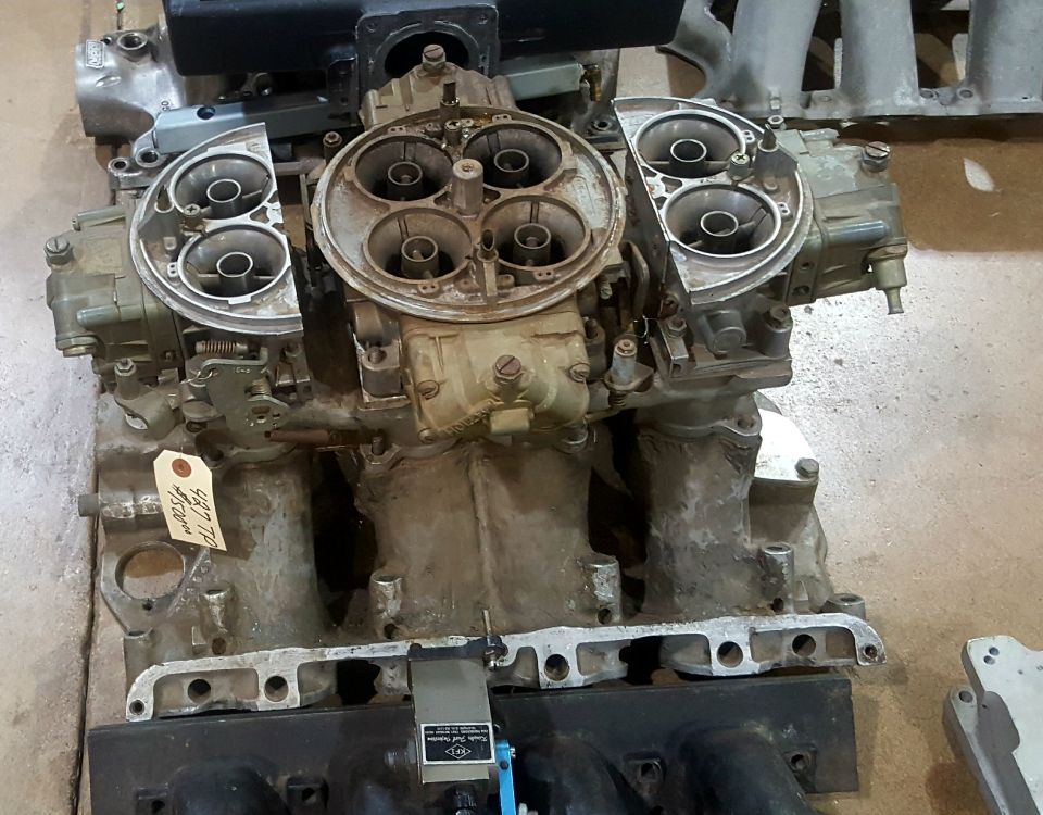 dual carburetors on intake manifold, tag says 427 T.F