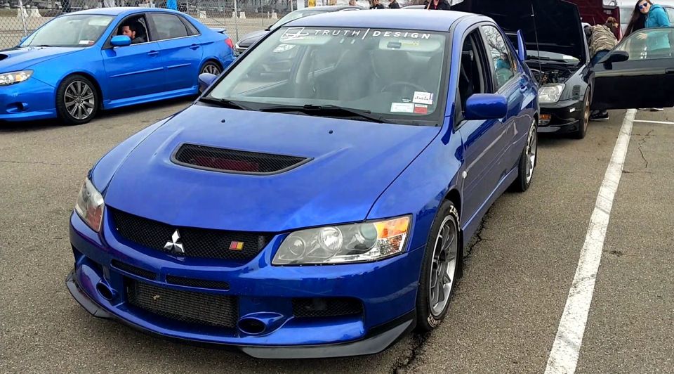 Blue 2006 Mitsubishi Lancer Evolution VIII front 3/4 view
