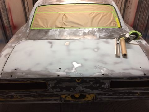 1969 Chevrolet Camaro - This car body is being prepped for paint, with masking tape covering the rear window. The registry claims it is a 1969 Chevrolet Camaro, bu…