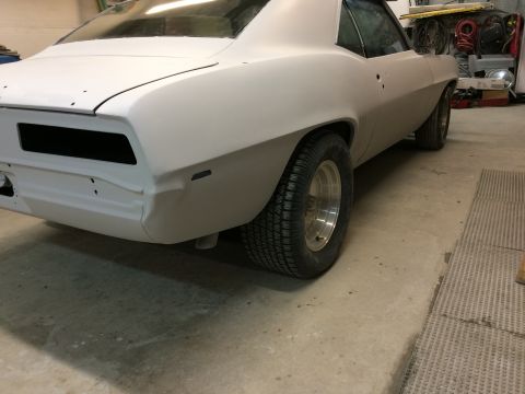 1969 Chevrolet Camaro - Rear view of a 1969 Chevrolet Camaro undergoing restoration, shown in primer.