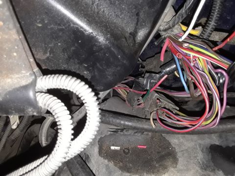 1985 Ford Bronco - Vehicle wiring harness with numerous colored wires and connectors visible.