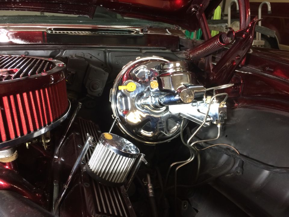 Engine bay with chrome brake booster and dual air cleaners