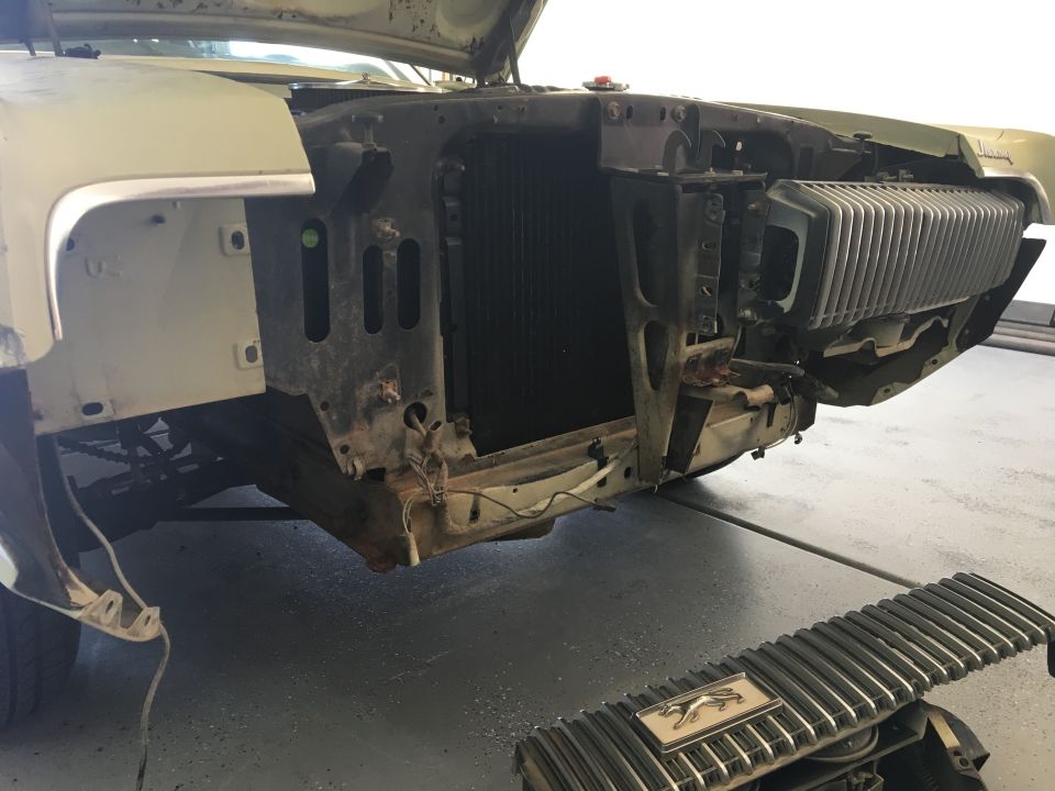 1968 Mercury Cougar front end with grille removed, showing radiator and support structure