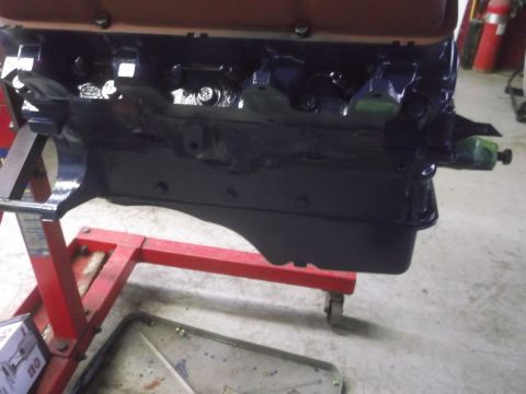 1967 Ford Galaxie - Engine block on a red stand, with a Supermotors.net watermark in the lower right corner.