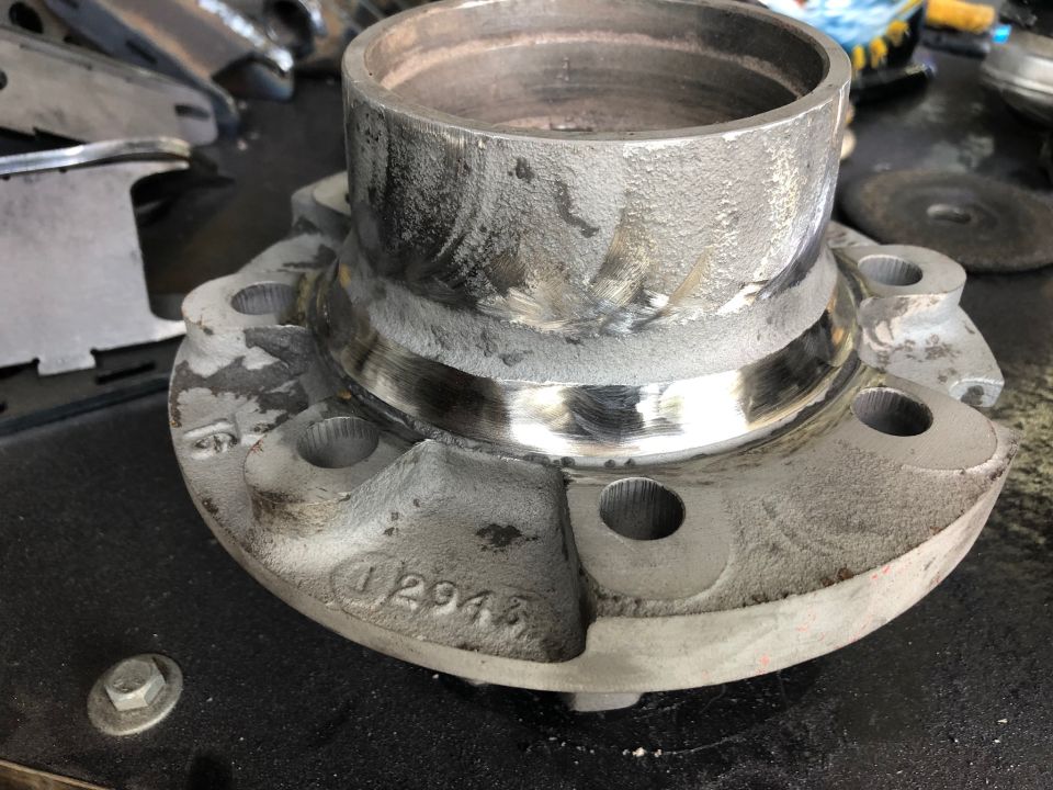 Wheel hub assembly with stamped numbers '12945'