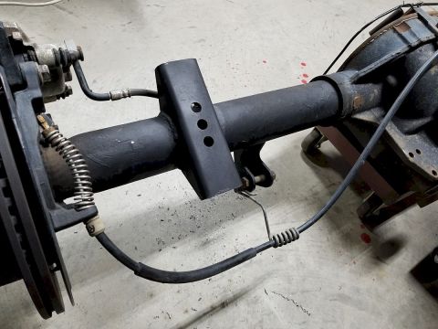 1983 Ford Bronco - I drilled the new shock mount for the original e-brake cable guide\\'s bolt, and the brake line guide\\'s bolt, so everything is routed & r…