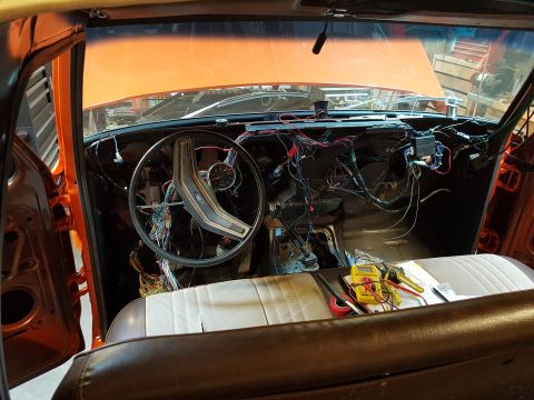 1978 Ford Bronco - The interior of a 1978 Ford Bronco shows extensive dashboard wiring work in progress.