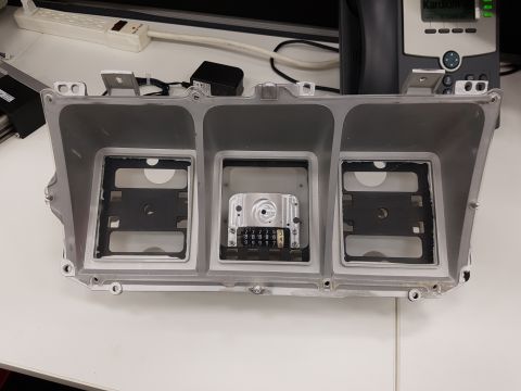 1978 Ford Bronco - This is a dashboard instrument cluster housing, likely from an older vehicle, with a visible odometer mechanism.