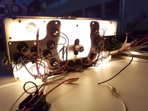 1978 Ford Bronco - Wiring for an automotive instrument cluster is being tested.