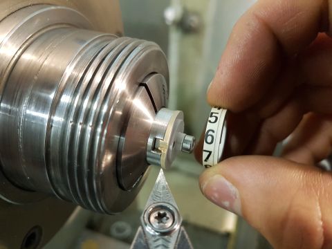 1978 Ford Bronco - A numbered ring is being machined on a lathe, with numbers 5, 6, and 7 visible.